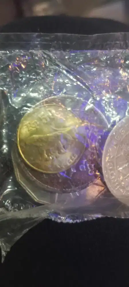 koin kuno dan kertas