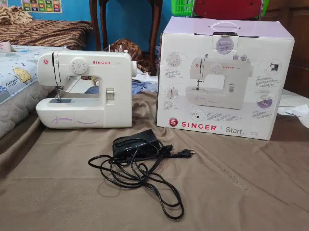 Mesin jahit portable singer