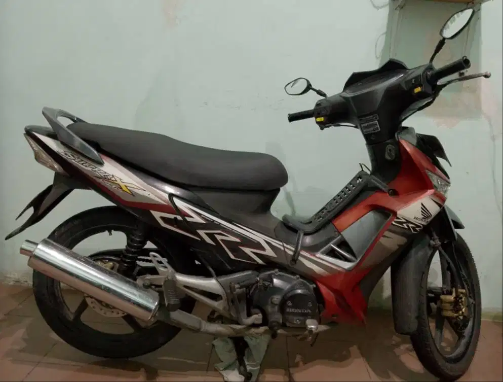 Supra X 125 tahun 2011 Taat Pajak