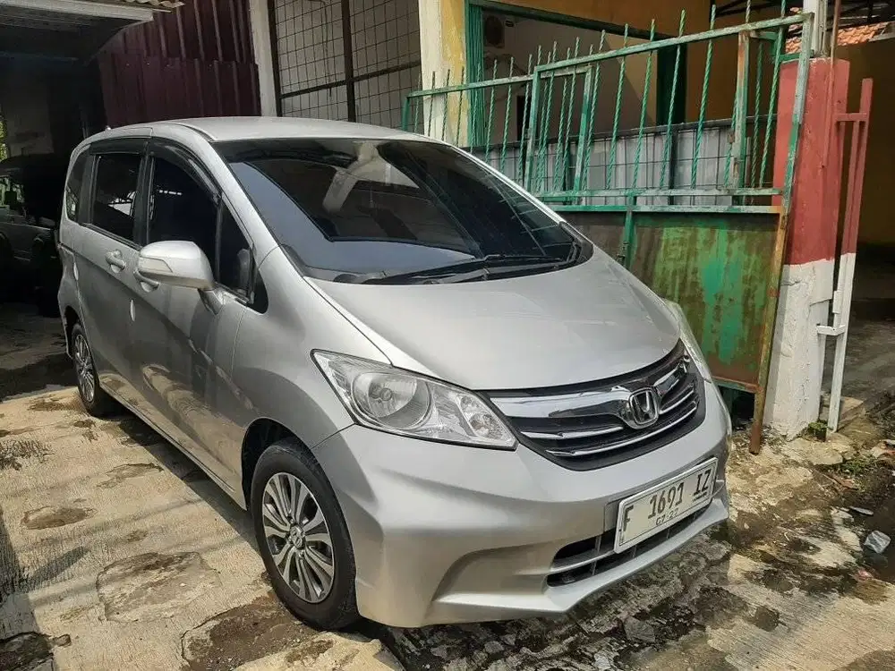 Freed Matic 2014 DP 5 jt Kredit