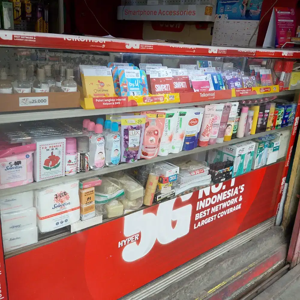 PETUGAS KONTER PULSA WANITA