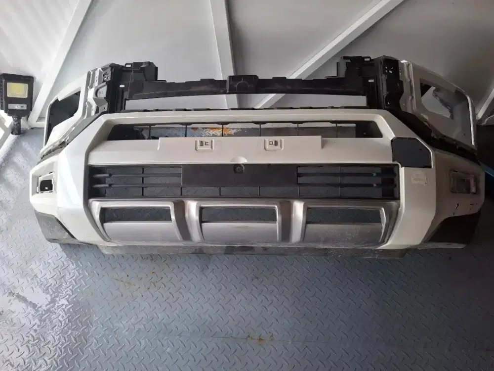 Bamper depan expander cross