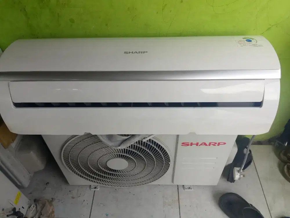 ac sharp 1pk zcy , termasuk pasang
