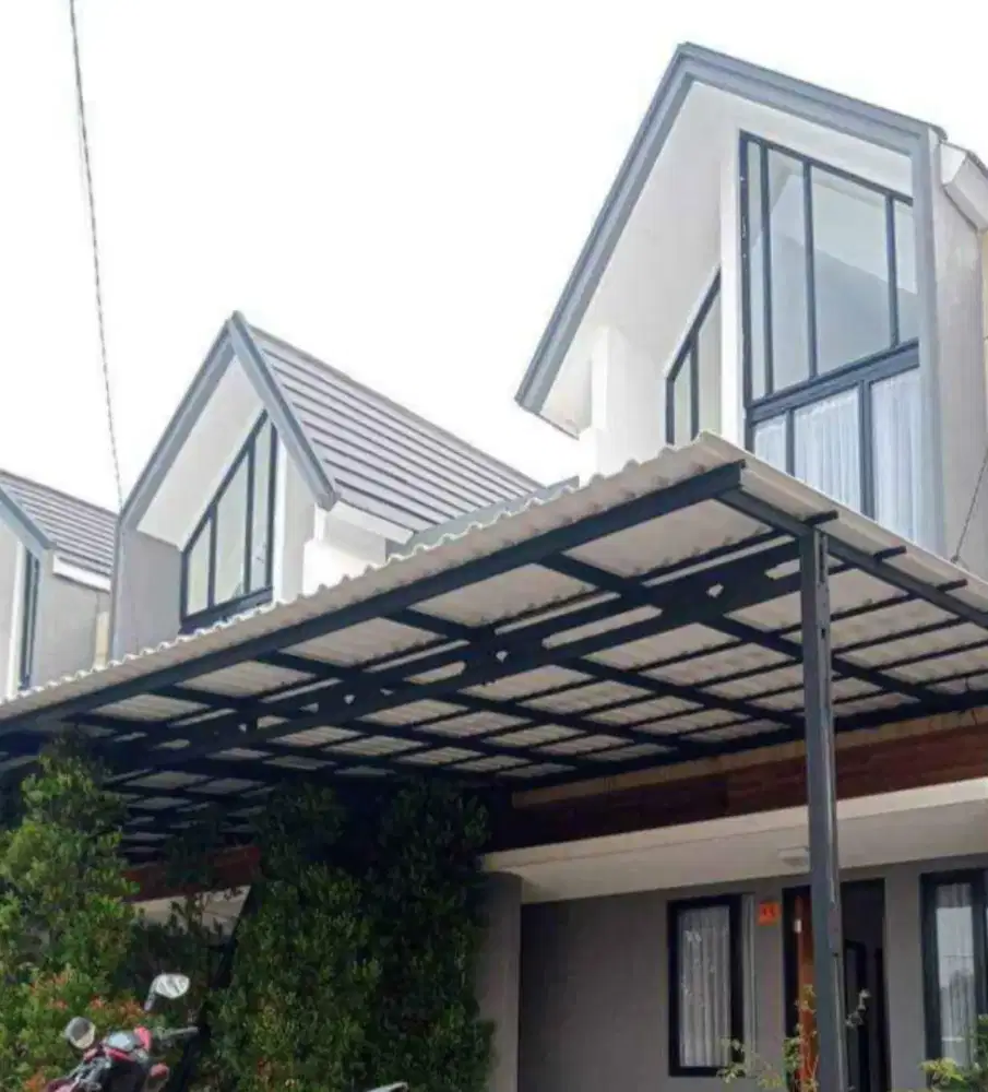 TukanG atap Rmh BocoR.dak rembes