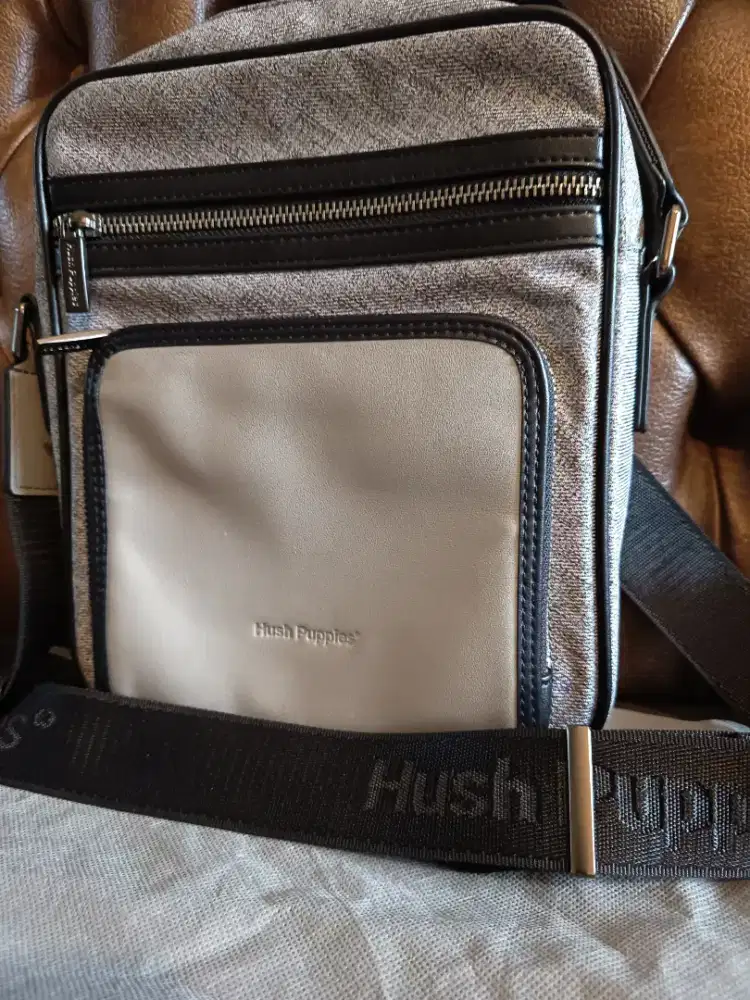 Tas sling hush puppies or