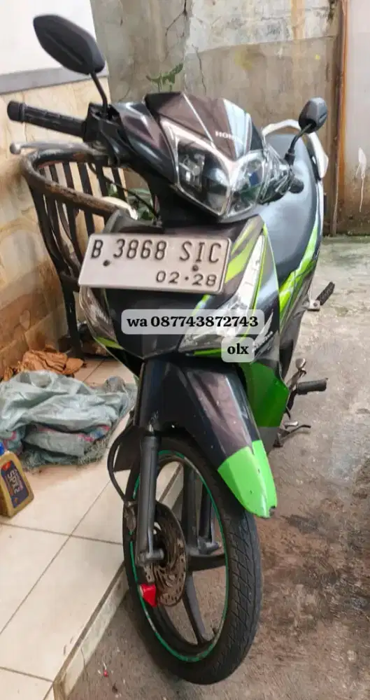 Motor Supra Helm tahun 2011