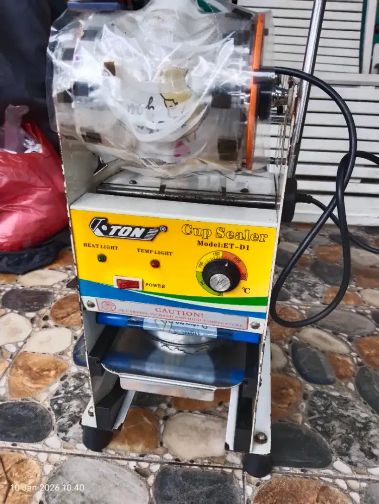 Mesin alat pres sealer eton