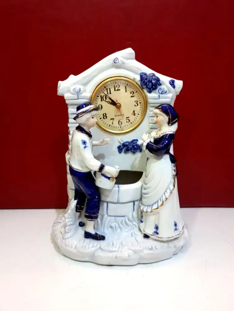 Jam meja patung keramik