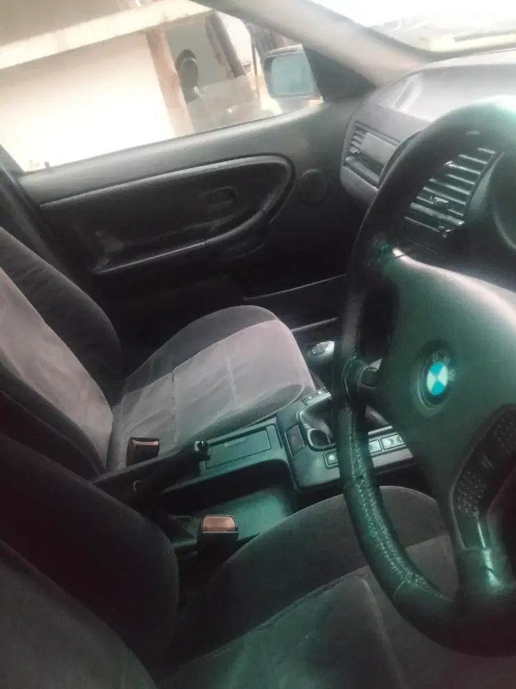 BMW 320i 1994 Bensin