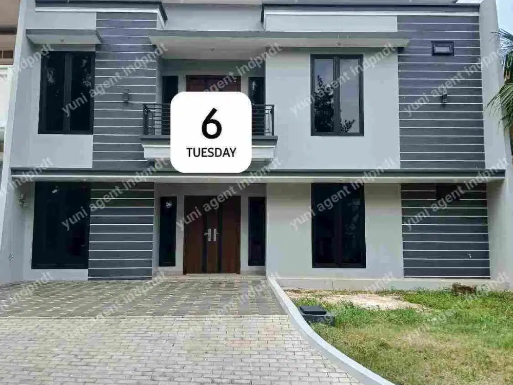 rumah renoved depan taman,kota wisata