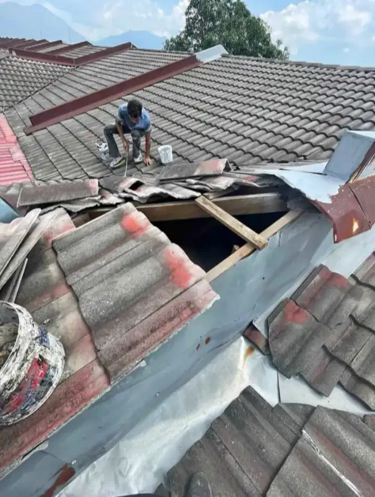 Perbaikan atap bocor dan renovasi rumah dll