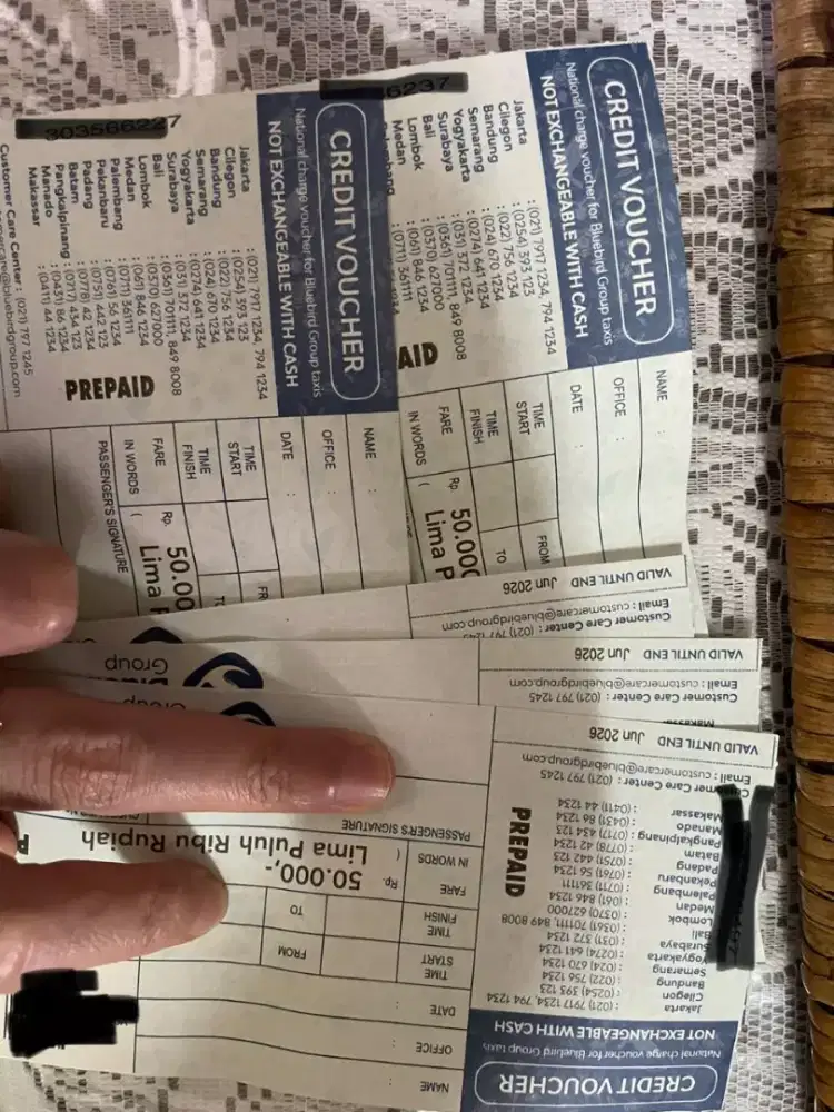 Voucher taxi blue bird