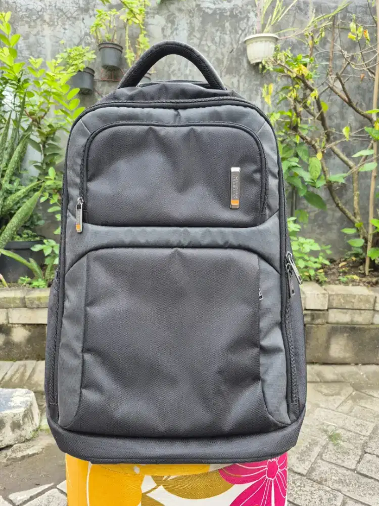 bagpack wheels american tourister
