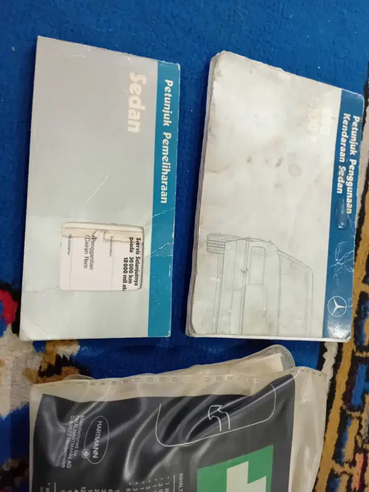 Buku manual dan P3k Mercedes W124