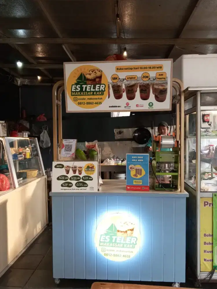 SPG jaga booth es Teler