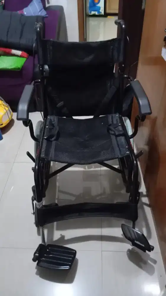 Kursi roda travelling