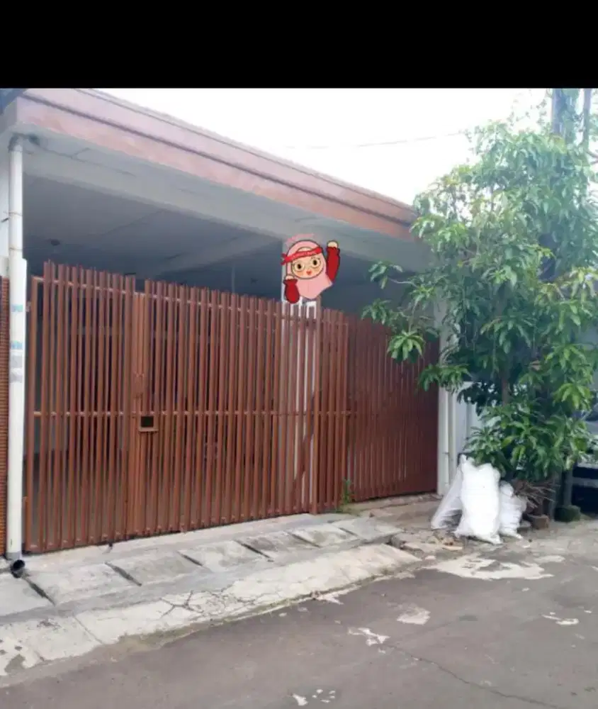 Rumah rapi 1,5 lantai di taman harapan baru Bekasi