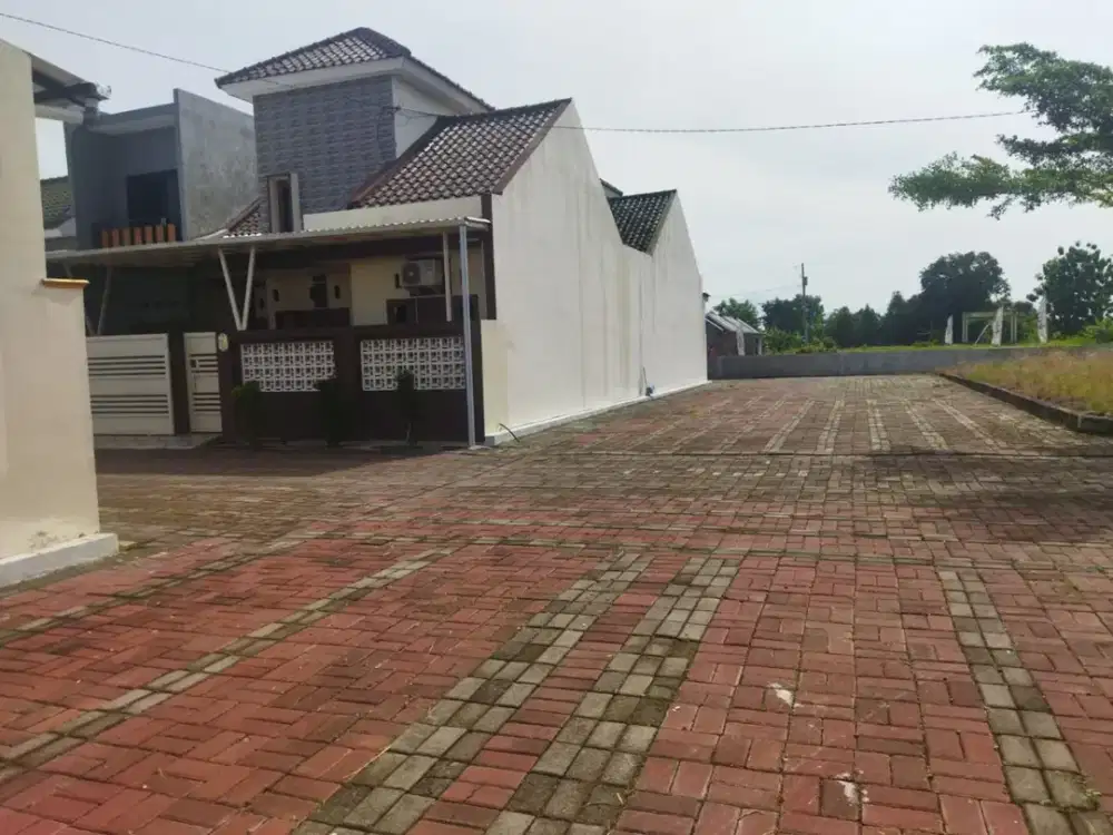 Dijual tanah kavling luas 98m2 lokasi dekat dari jalan raya bisa untuk investasi jangka panjang Proses bank DP 0%