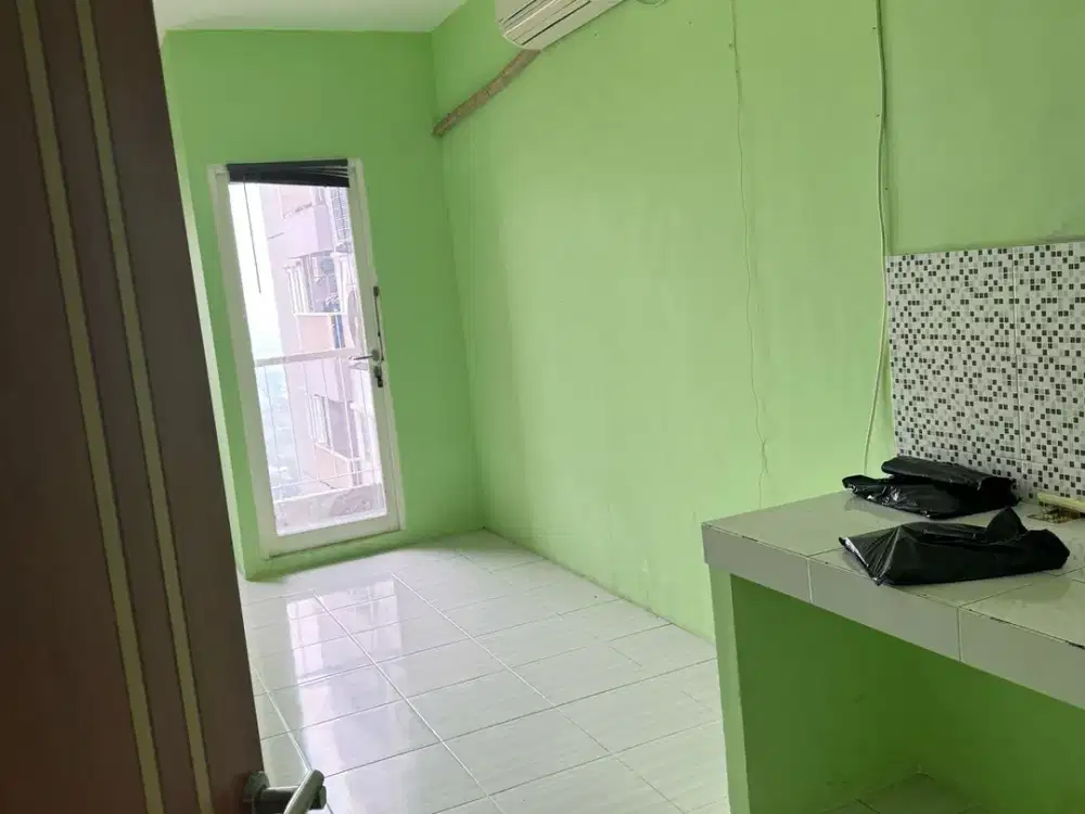 Apartemen 2 kamar Puncak Dharmahusada sudah ada AC view kota high flor