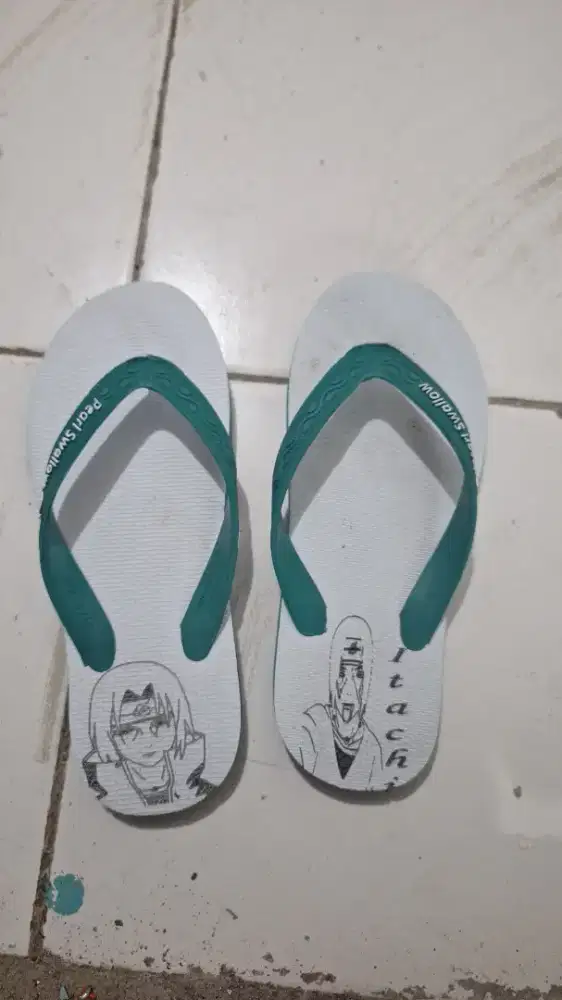 Sandal jepit Swalow ukir laser