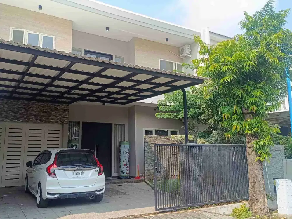 Rumah minimalis terawat di Citraland row double way dekat gwalk