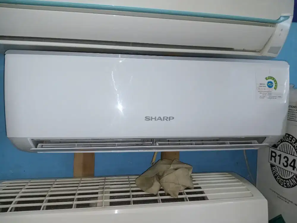 AC SHARP SETENGAH PK