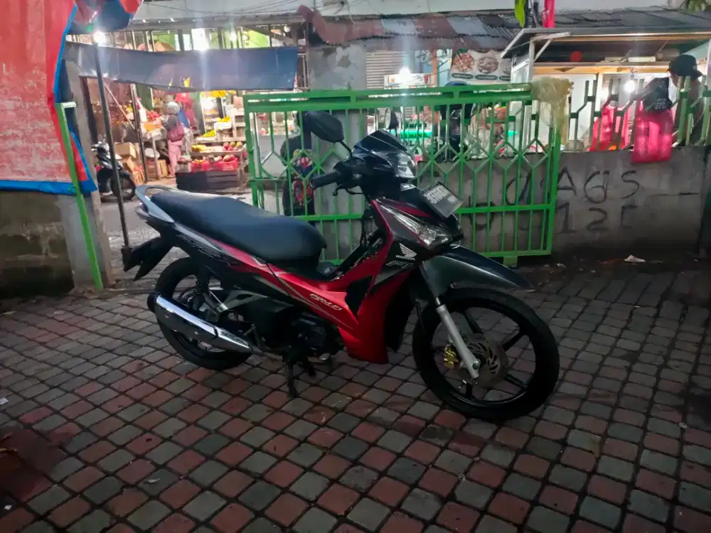 Honda Supra X Helm In 125cc PGM-FI Tahun 2012