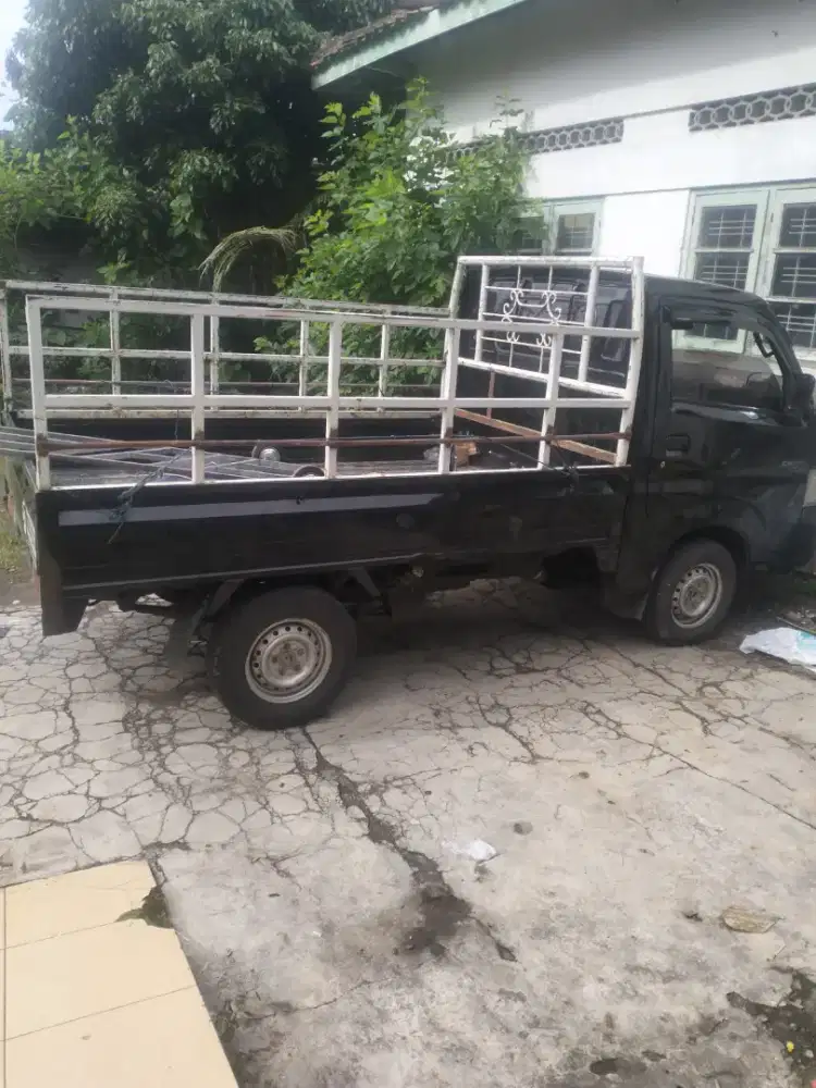 Jasa angkut paket kargo pengiriman barang kulkas kasur mesin cuci