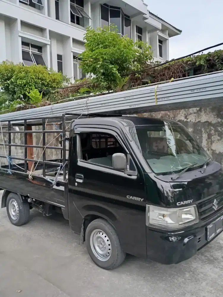 Jasa angkut besi galvalum hollow beton kramik semen