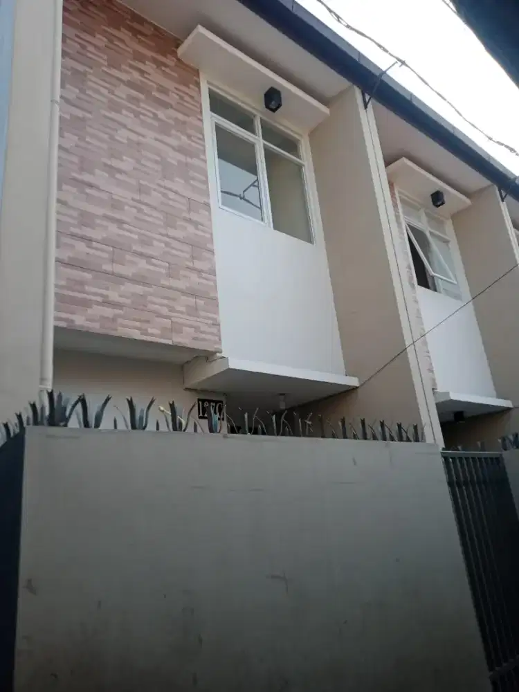 Rumah strategis minimalis tengah kota