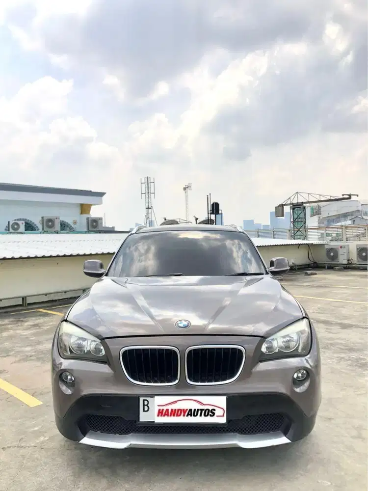 BMW X1 Executive Tahun 2011 Automatic Coklat Metalik