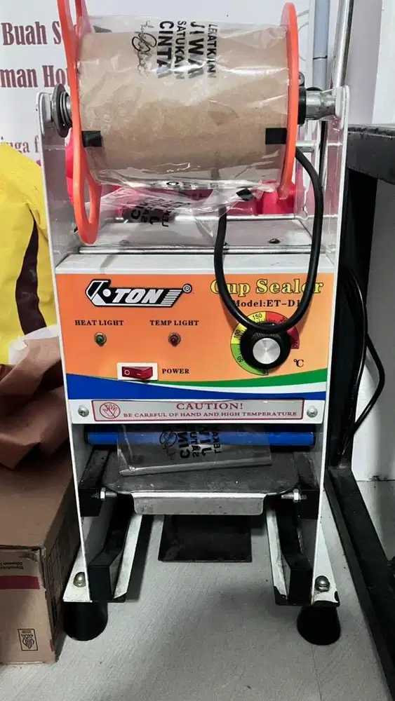 Cup sealer alat press