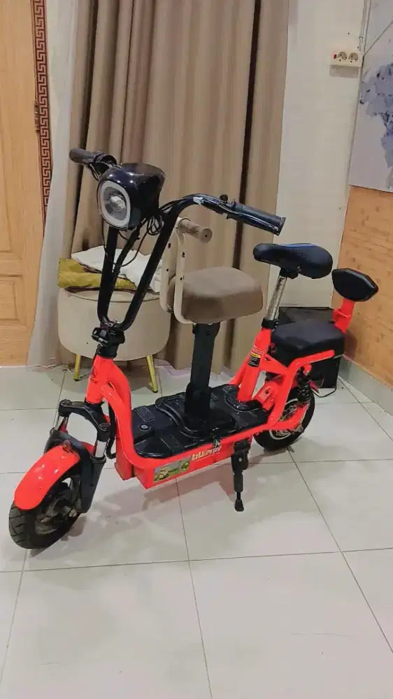 Sepeda listrik merk exotic