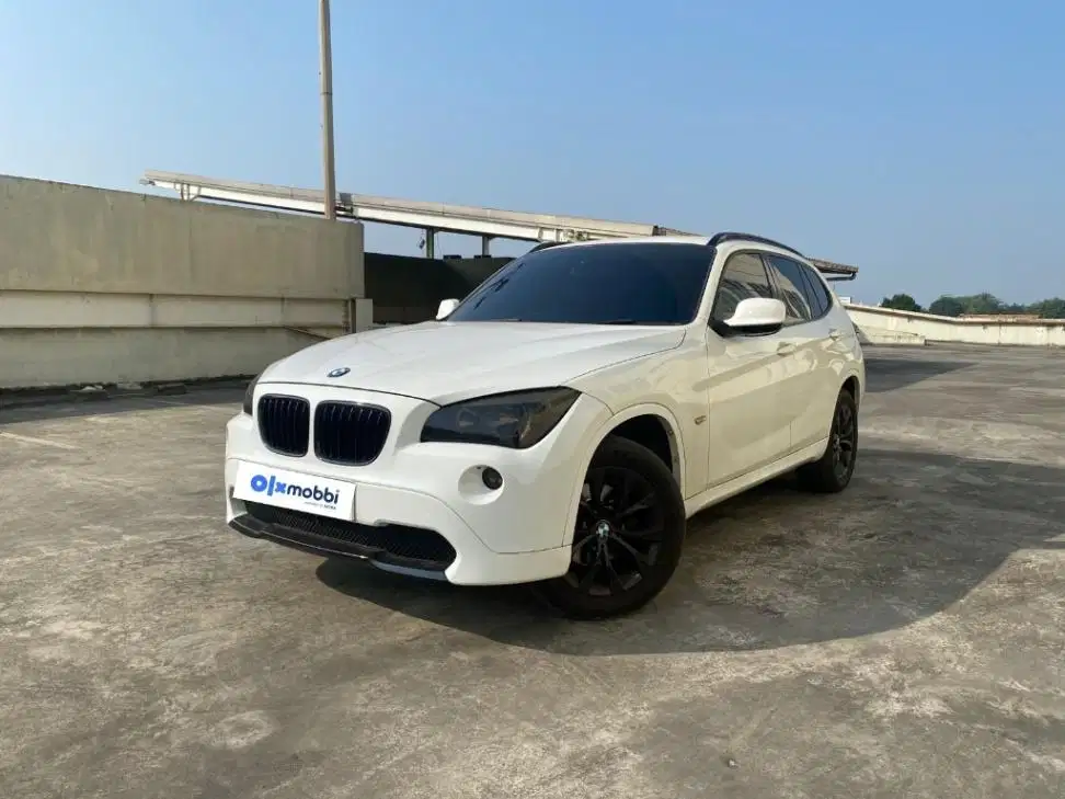 DP Rendah  14JT - BMW X1 2.0 sDrive18i xLine Bensin-AT 2012 Putih