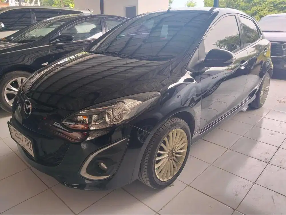 Mazda 2 manual tahun 2013