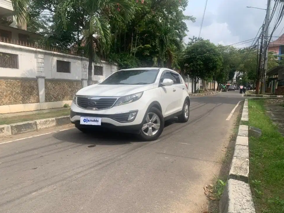TDP 6,JT Kia Sportage 2.0 SE Bensin-MT Putih 2013
