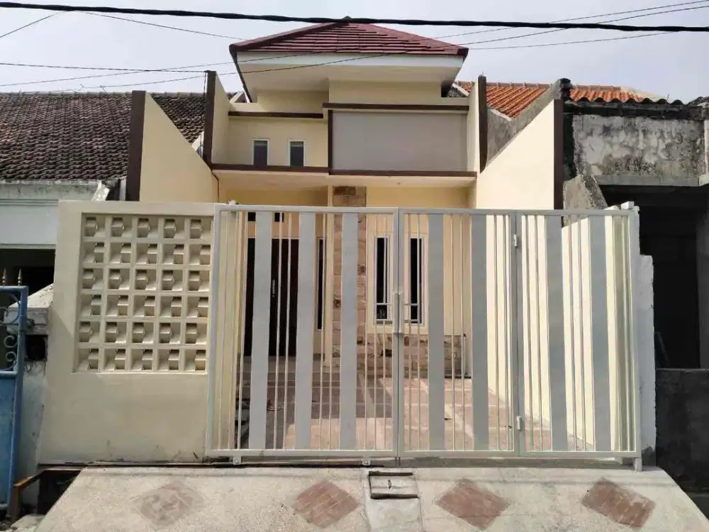 rumah 1lt cantik strategis Surabaya oper kredit 6jt an per bln