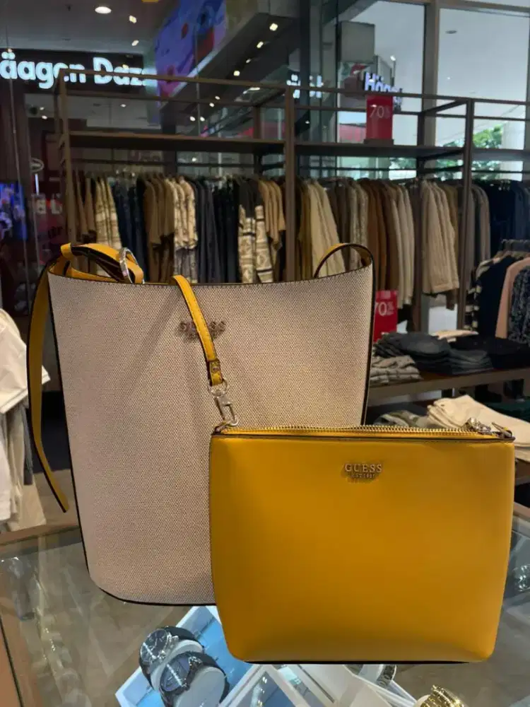 Guess Nicolette large bucket shoulder bag in canvas