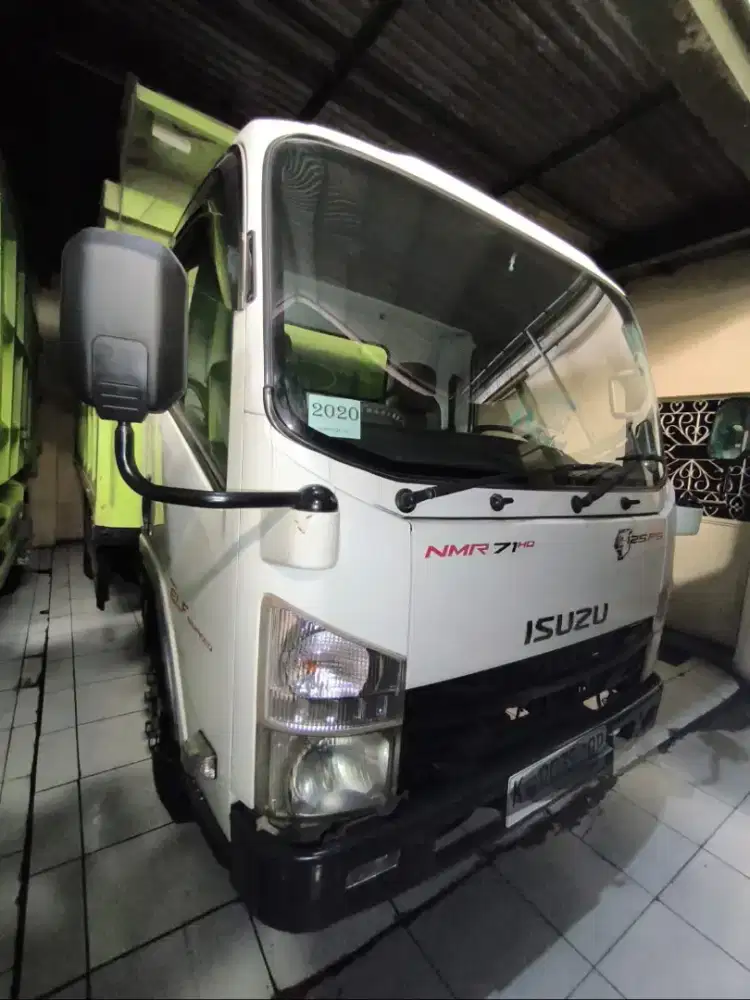 Isuzu Elf NMR 6.1 light truk dump jumbo