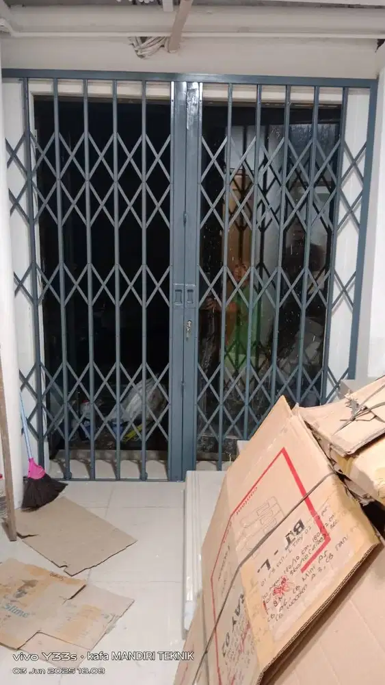 Pintu harmonika / acordion pengaman ruko pasang service murah