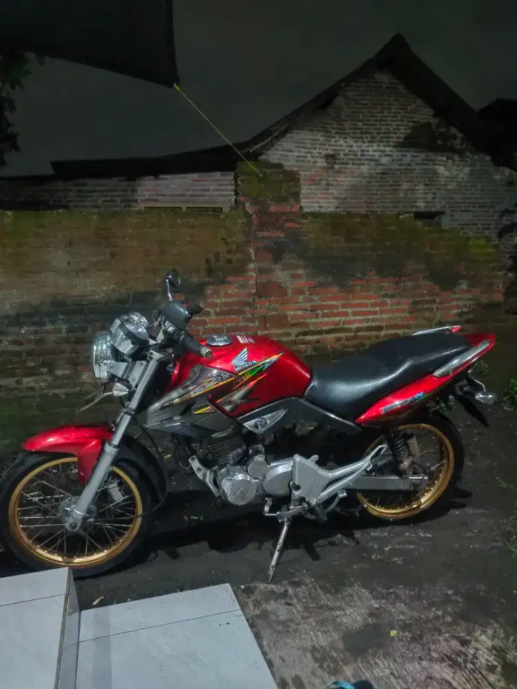 tiger revo asli merah