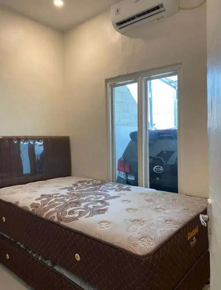 Over kredit rumah annieland cisoka