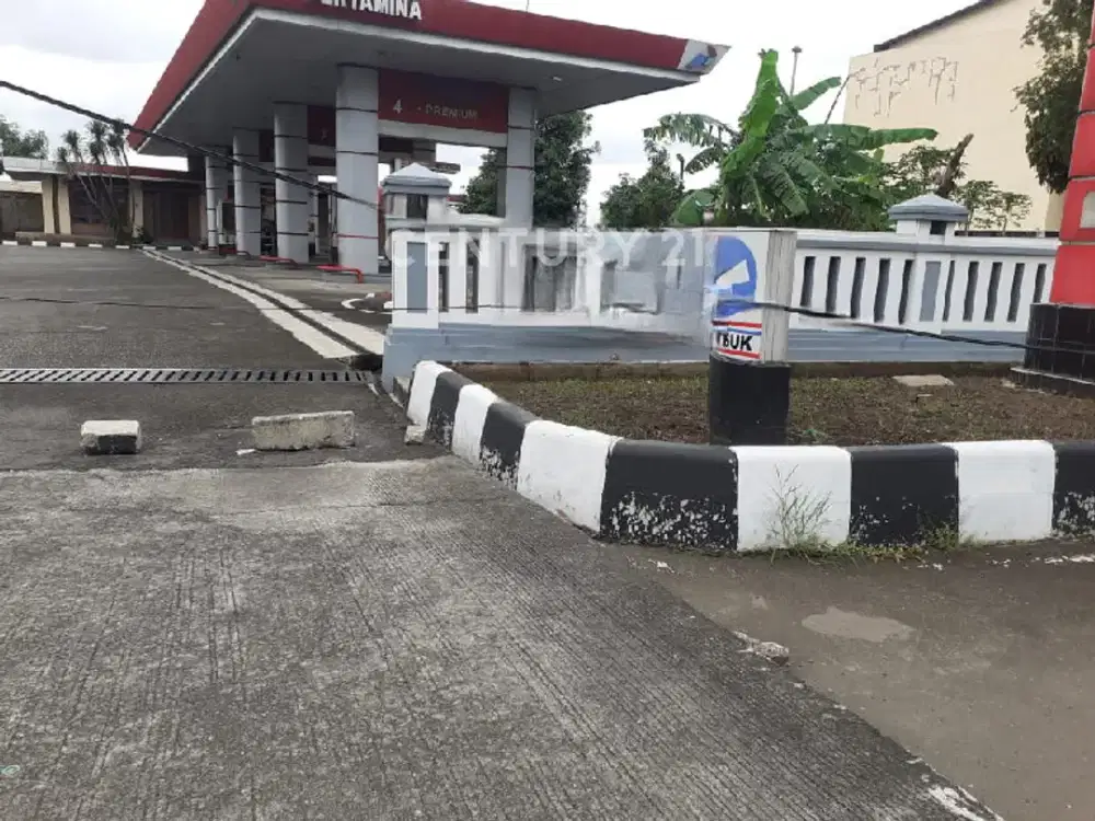 TANAH SELUAS 2.647 M² DAN BANGUNAN POM BENSIN