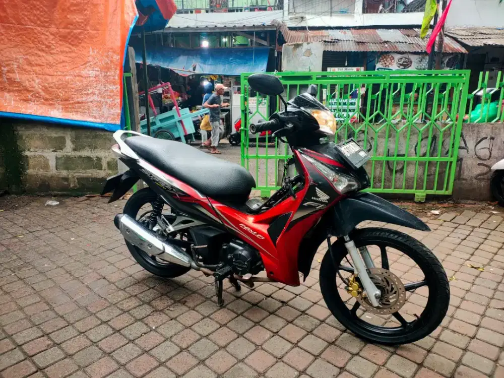 Honda Supra X Helm In 125 PGM-FI Tahun 2012