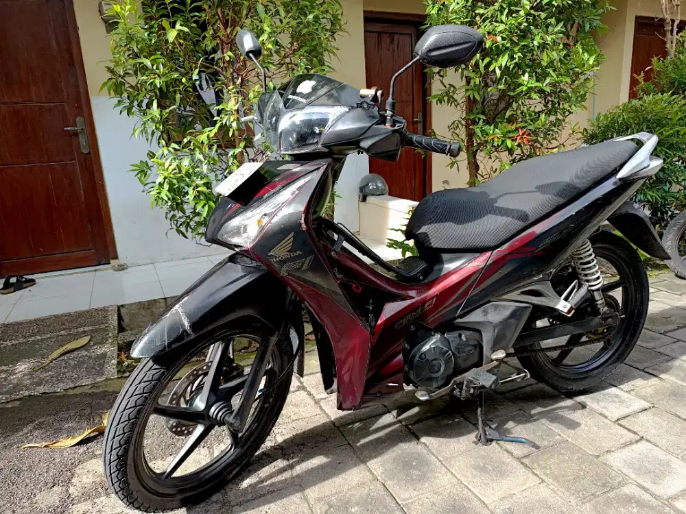 Supra X 125 Helm in injeksi