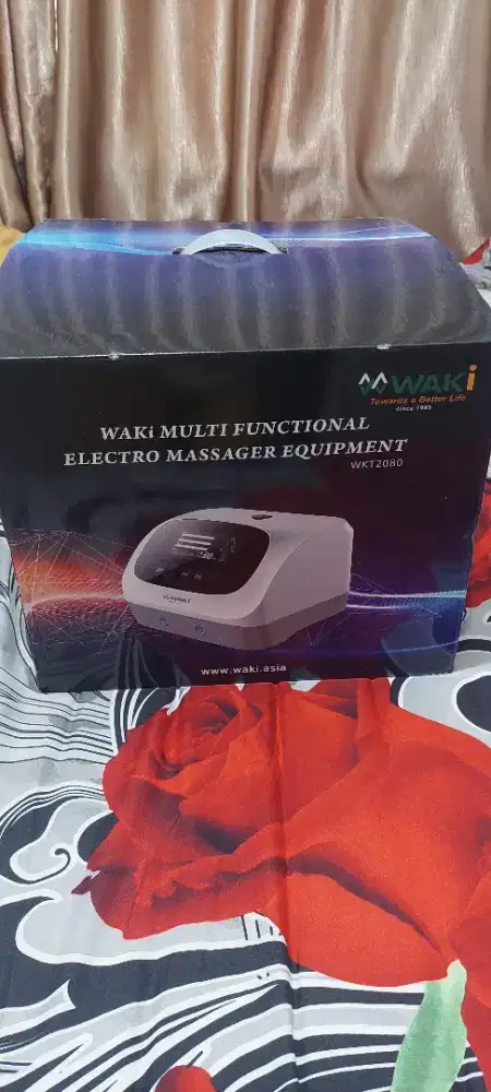 Preloved Massager kaki dan tangan plus untuk pinggang merk WAKI. Nett