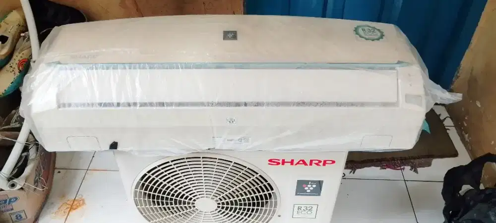 ac sharp 1/2pk R32 ori garansi