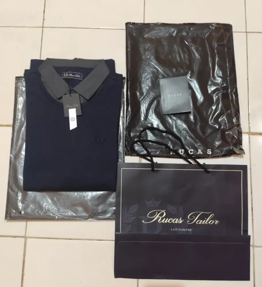 Baju Kaos Kerah Rucas Original Baru