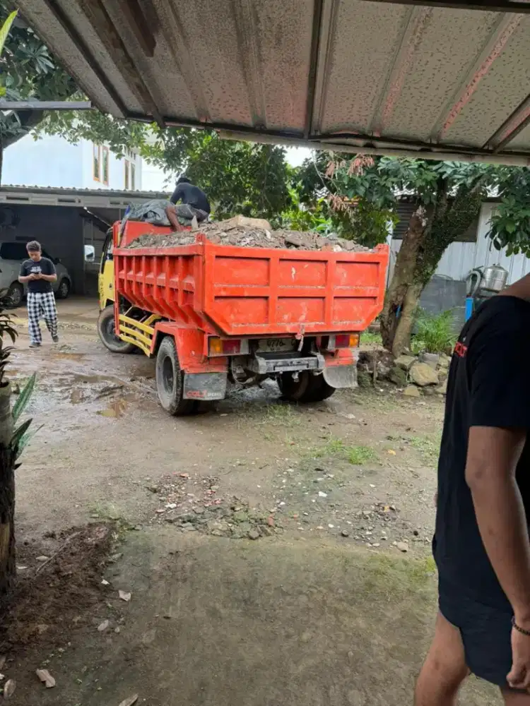 Jasa pengurugan dan buang puing