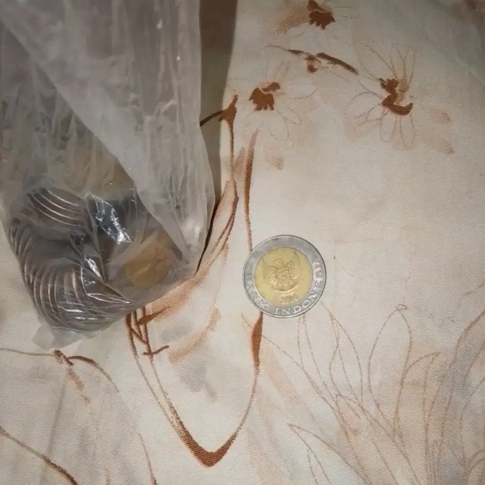 Uang koin 1000 kelapa sawit